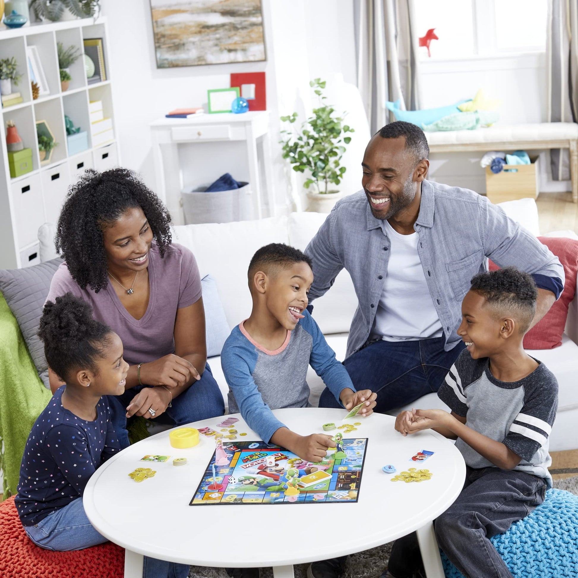 Monopoly Junior Super Mario Edition Board Game, Fun Kids' Ages 5 and Up, Explore The Mushroom Kingdom as Mario, Peach, Yoshi, or Luigi ( Exclusive)