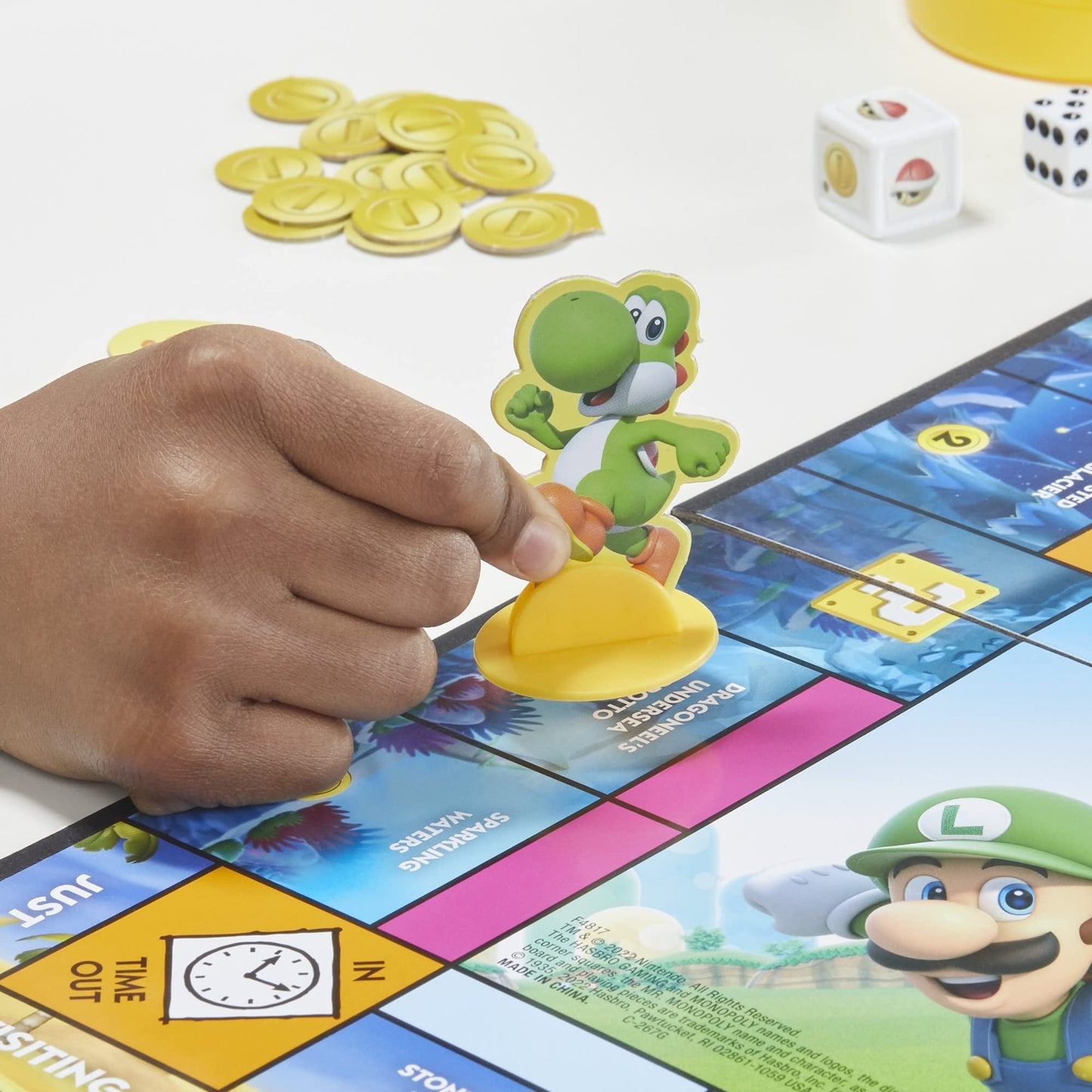 Monopoly Junior Super Mario Edition Board Game, Fun Kids' Ages 5 and Up, Explore The Mushroom Kingdom as Mario, Peach, Yoshi, or Luigi ( Exclusive)